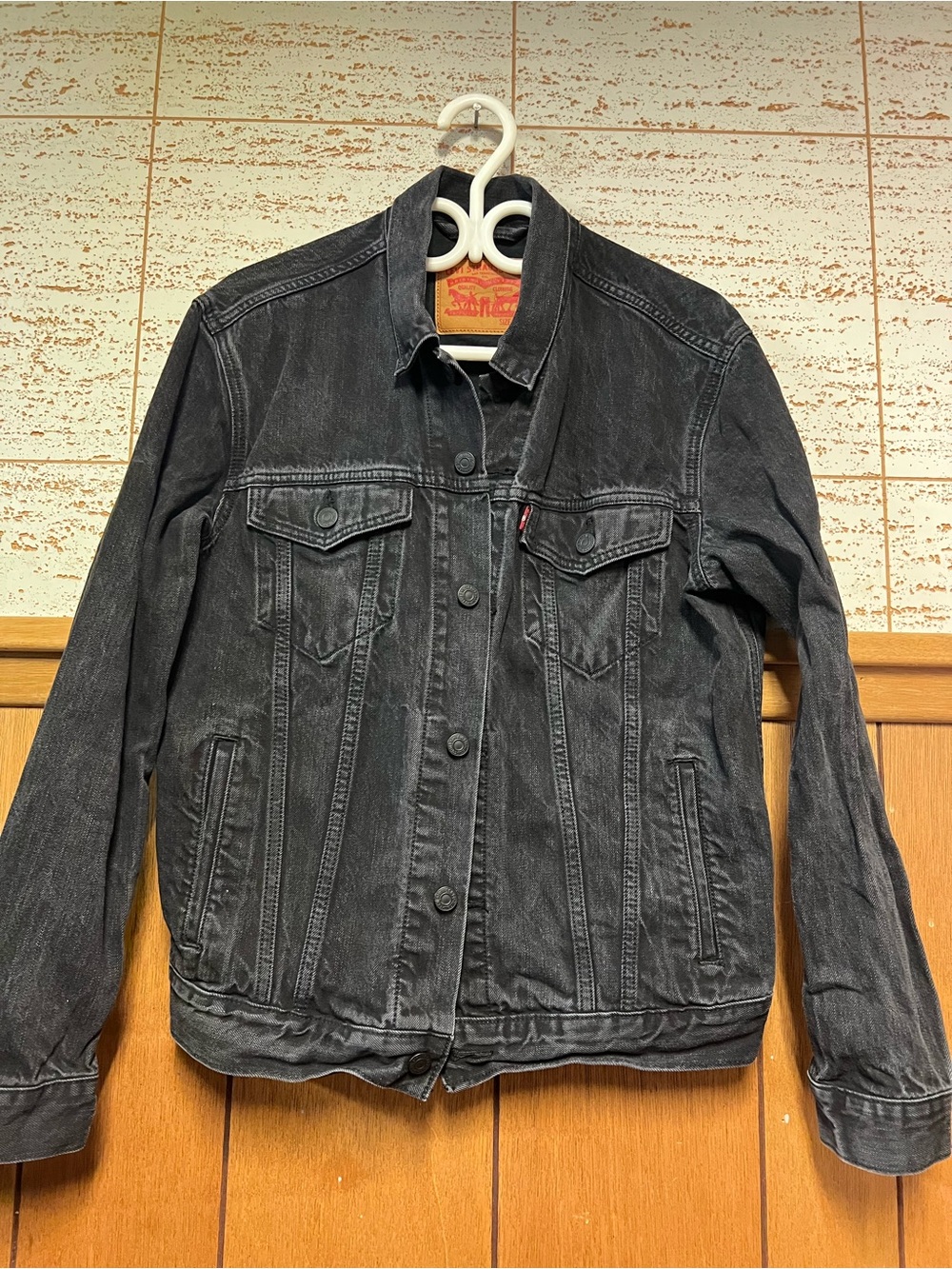 Levi's Faded Black Denim Trucker Jacket